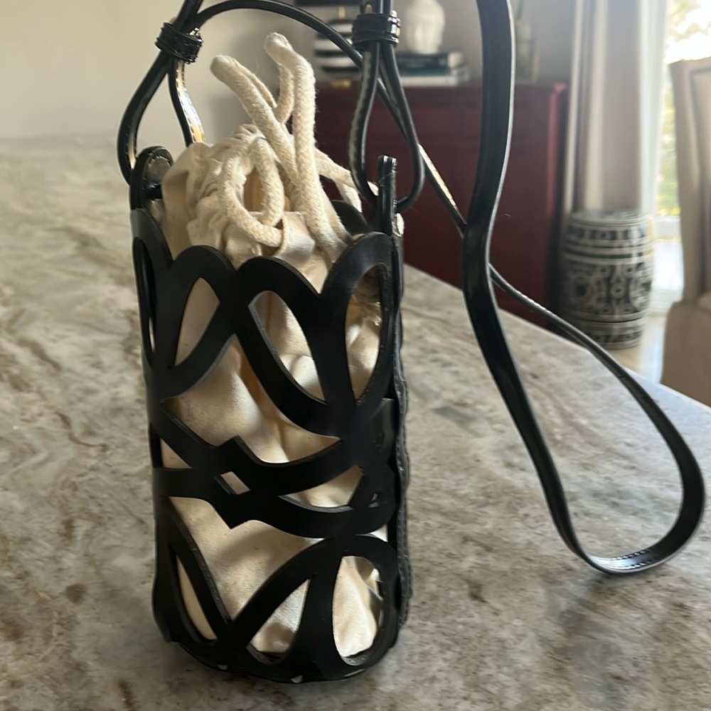 Black bucket bag with linen drawstring insert